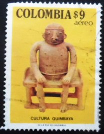 Selo postal da Colômbia de 1981 Seated man on stool