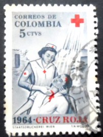 Selo postal da Colômbia de 1965 Nurse with the injured party