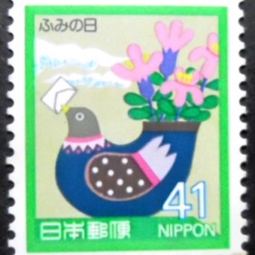 1989 - Bird as vase holding envelope