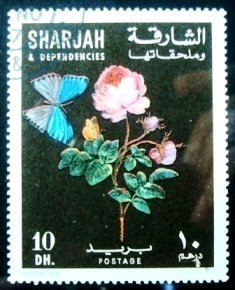 Selo postal Sharjah 1967 Hybrid tea rose and blue-gray butterfly