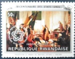 Selo postal da Ruanda de 1976 Presentation of captured flags overprint M A