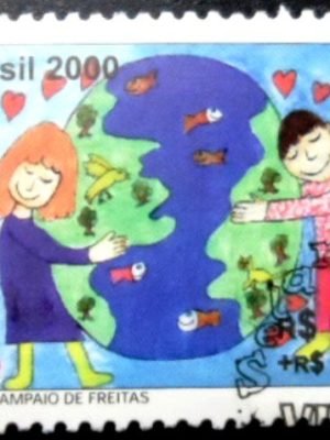 Selo postal do Brasil de 2000 Criança e Globo MCC