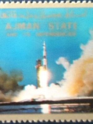 Selo de postal de Ajman de 1973 Launch of a rocket NCC A