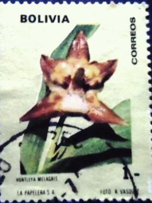 Selo postal da Bolívia de 1974 Huntleya meleagris U