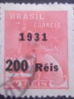 Selo postal do Brasil de 1931 Mercúrio e Globo Sobrecarga Preta J