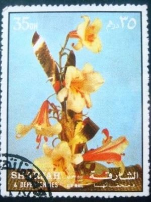 Selo postal do Sharjah de 1972 Lilies