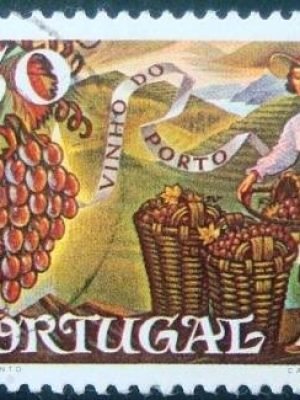 Selo postal de Portugal de 1970 Grapes and woman filling baskets